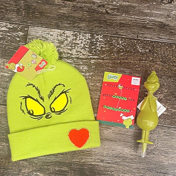 The Grinch Accessories - Grinch Green Beanie with Heart Patch, bracelets, and pen.